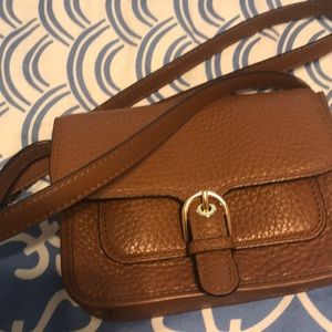 Michael Kors small crossbody in luggage.